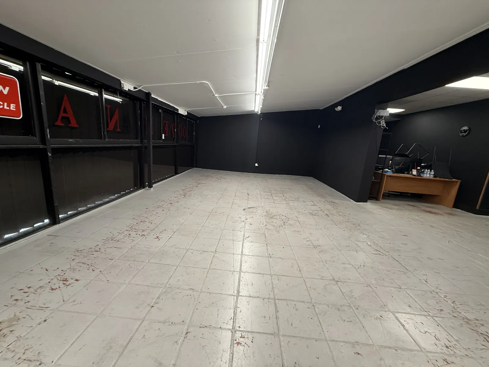 Commercial interior painted in black, walls and ceiling, Miami