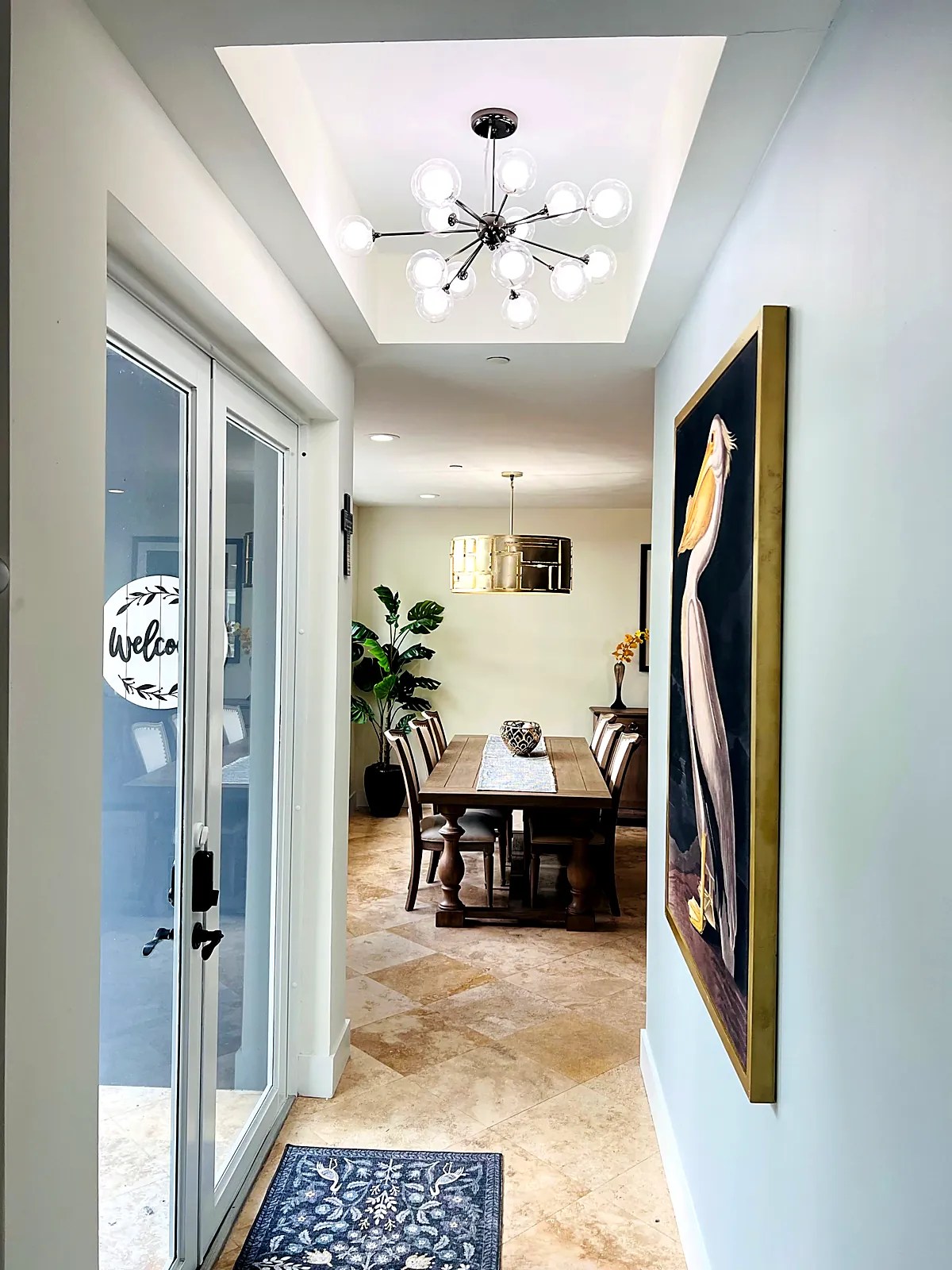 Freshly painted entry hall and dining room with white trim in Fort Lauderdale