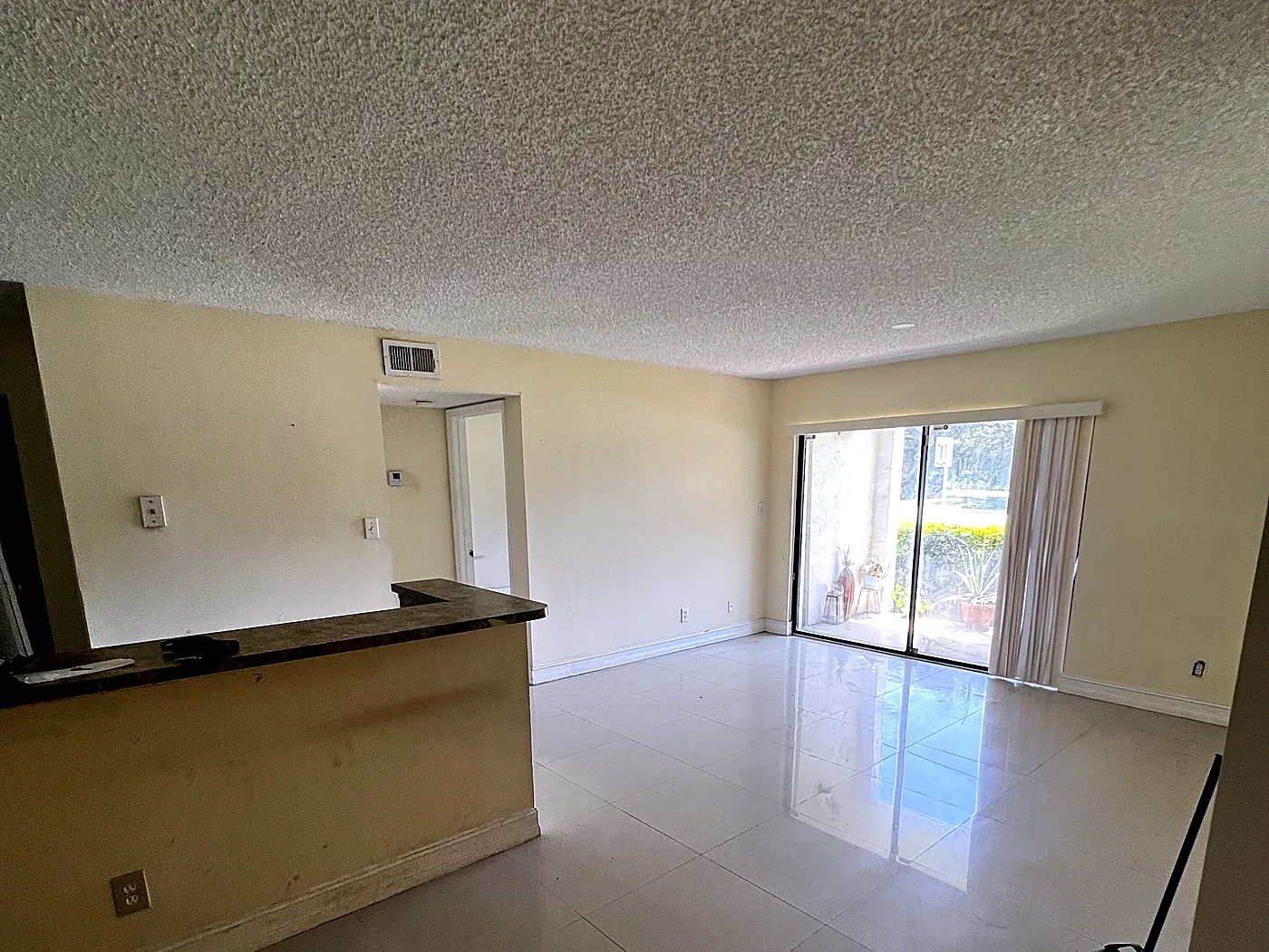 Hollywood apartment living room before interior painting